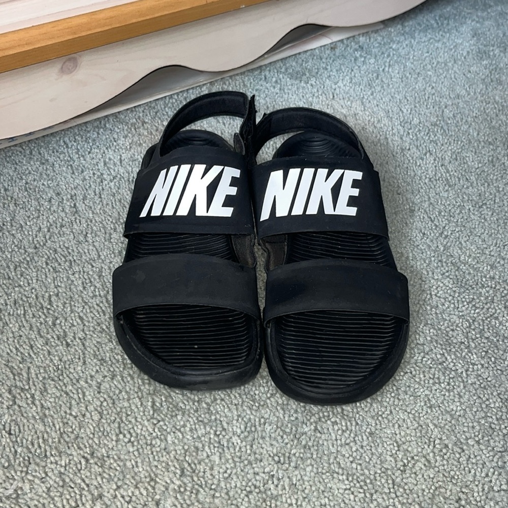 Black Nike Velcro sandals (woman’s 10)